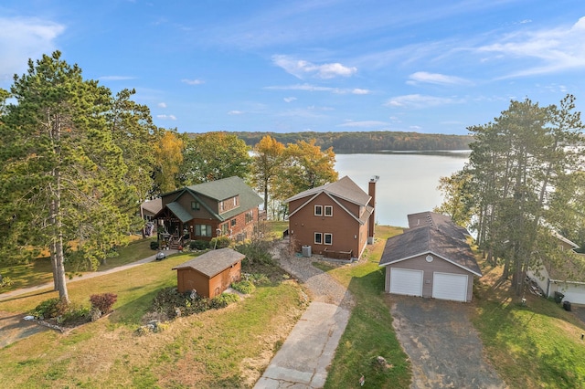 drone / aerial view with a water view