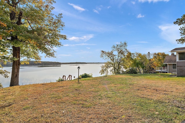 view of yard with a water view