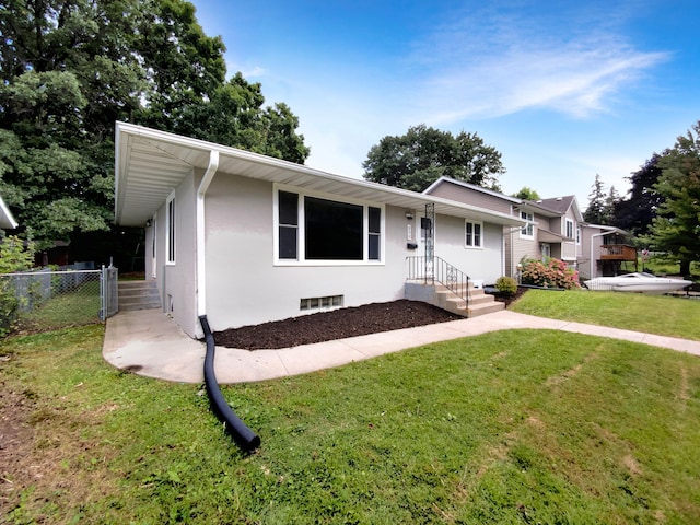 view of front of property with a front lawn