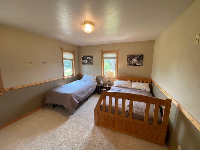 bedroom featuring carpet