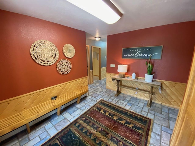 interior space featuring wood walls