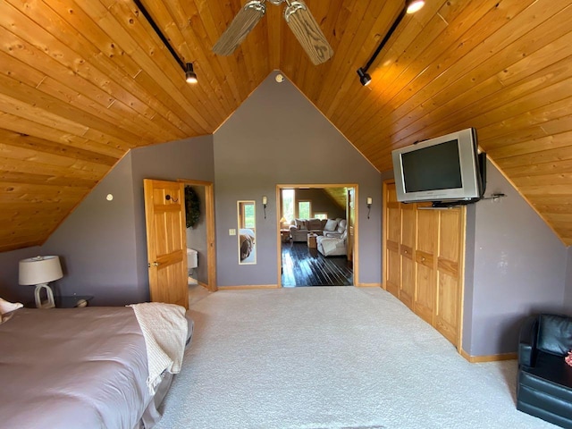 carpeted bedroom featuring wood ceiling, ceiling fan, lofted ceiling, and a closet