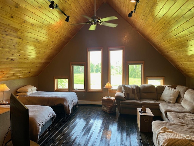 bedroom featuring wooden ceiling, a baseboard radiator, track lighting, dark wood-type flooring, and ceiling fan