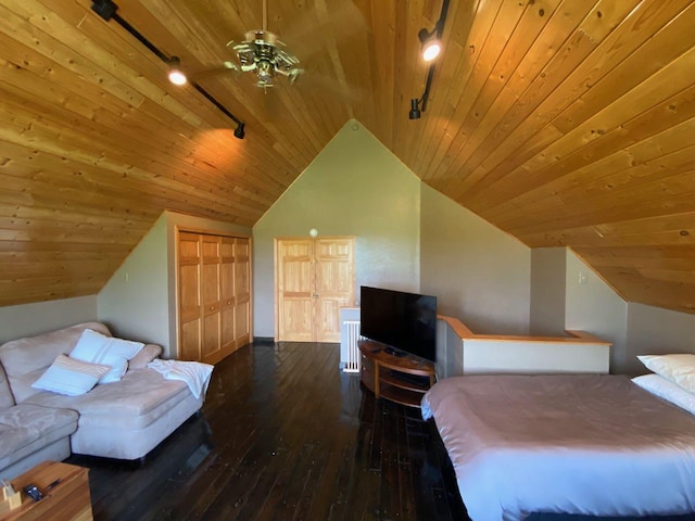 bedroom featuring wooden ceiling, dark hardwood / wood-style floors, a closet, and vaulted ceiling