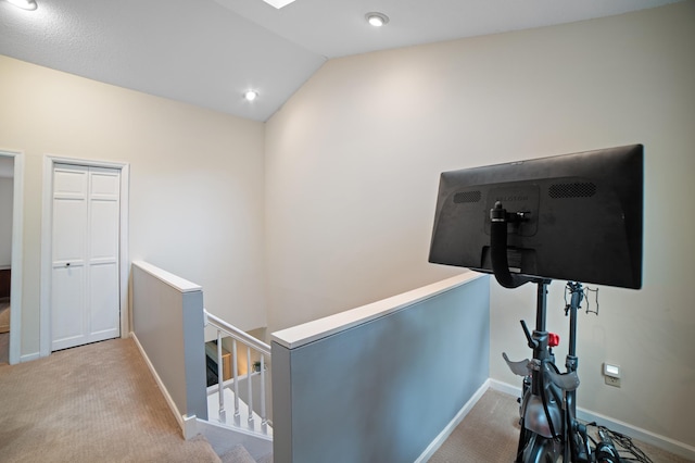 17661 Southridge Ct, Minnetonka, MN 55345 - hallway with an upstairs landing, baseboards, carpet floors, vaulted ceiling, and recessed lighting
