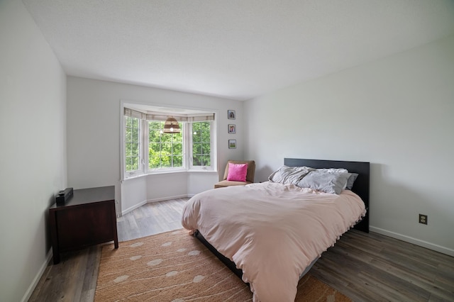 17661 Southridge Ct, Minnetonka, MN 55345 - bedroom with wood finished floors and baseboards