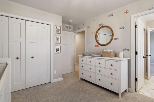 bathroom with vanity and a textured ceiling