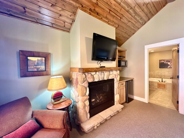 living room featuring vaulted ceiling, a stone fireplace, light tile patterned floors, and wood ceiling