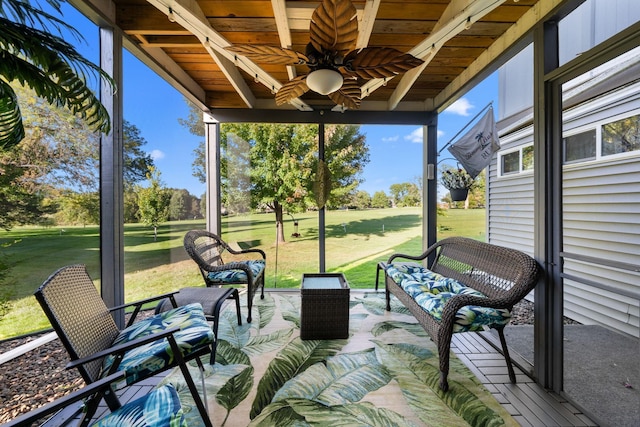 sunroom / solarium featuring an outdoor living space and ceiling fan