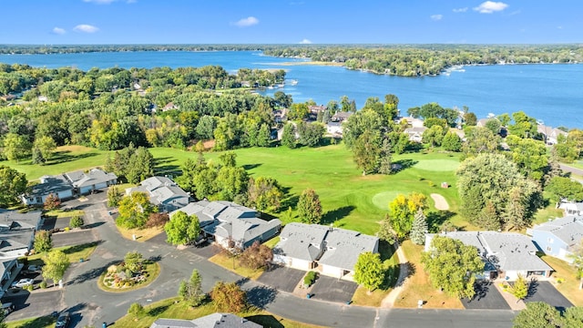 bird's eye view with a residential view and a water view