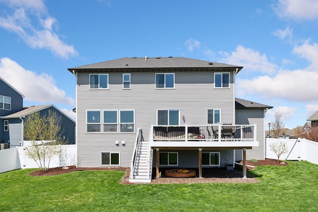 back of house with stairs and a wooden deck