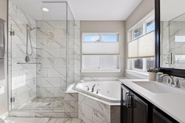 full bath with marble finish floors, a shower stall, a whirlpool tub, and vanity