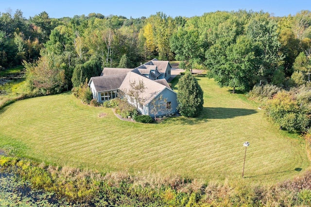 birds eye view of property with a rural view