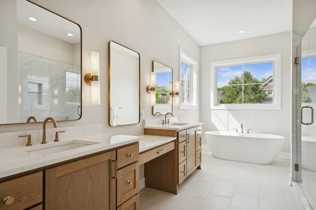 bathroom with tile patterned floors, vanity, and plus walk in shower