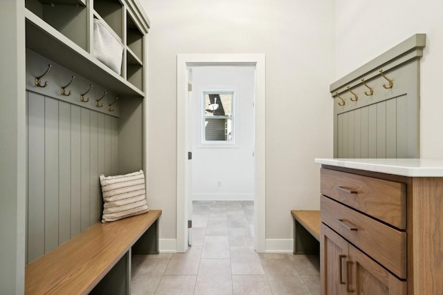 mudroom with light tile patterned floors