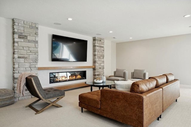 living room with light carpet and a fireplace