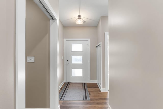 doorway with wood-type flooring