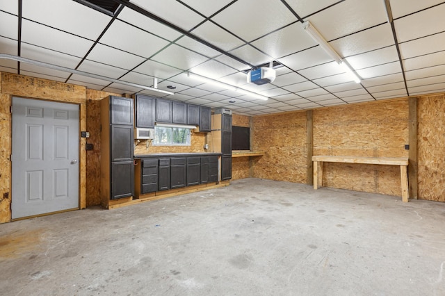 basement featuring a drop ceiling