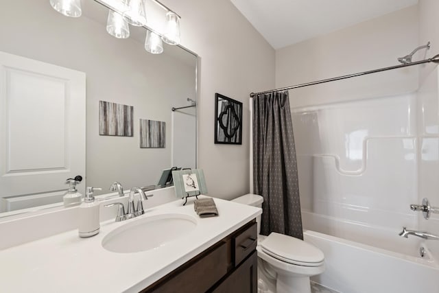 full bathroom with vanity, toilet, and shower / tub combo with curtain