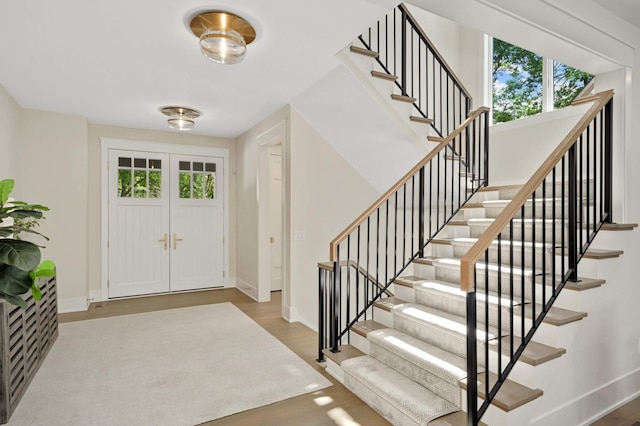 entrance foyer with light hardwood / wood-style flooring