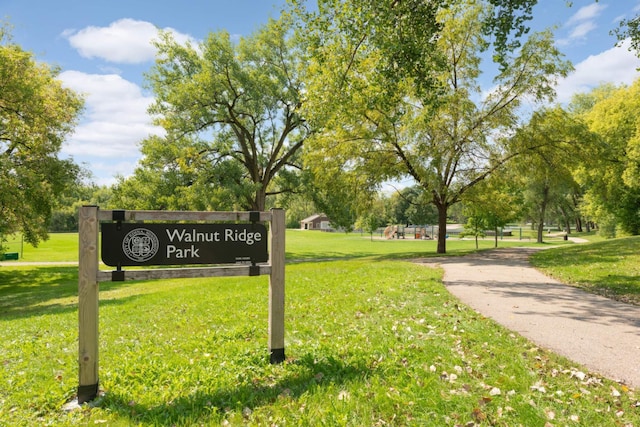 view of home's community with a lawn