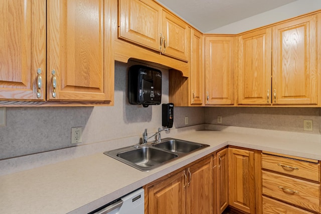 kitchen with backsplash and sink