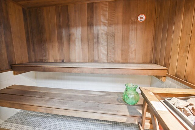 view of sauna / steam room with wooden walls