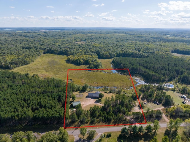 aerial view featuring a forest view