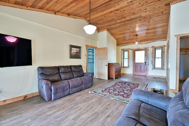 living area with high vaulted ceiling, wooden ceiling, baseboards, and wood finished floors