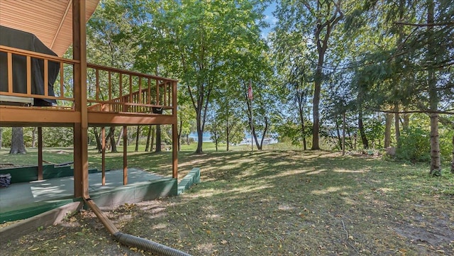 view of yard featuring a wooden deck