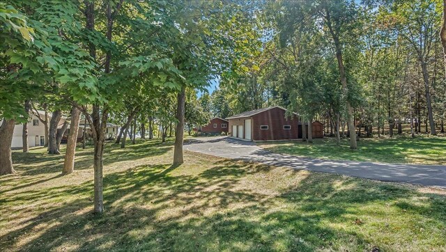 view of yard with a garage