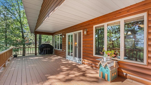 wooden deck with area for grilling