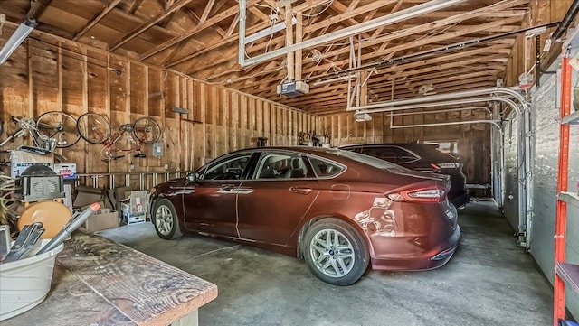 garage featuring a garage door opener