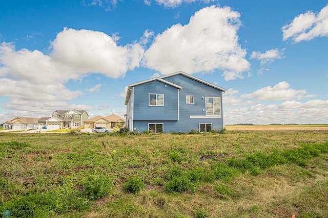 view of side of property with central AC unit