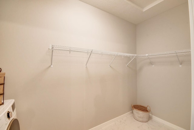 walk in closet featuring washer / clothes dryer