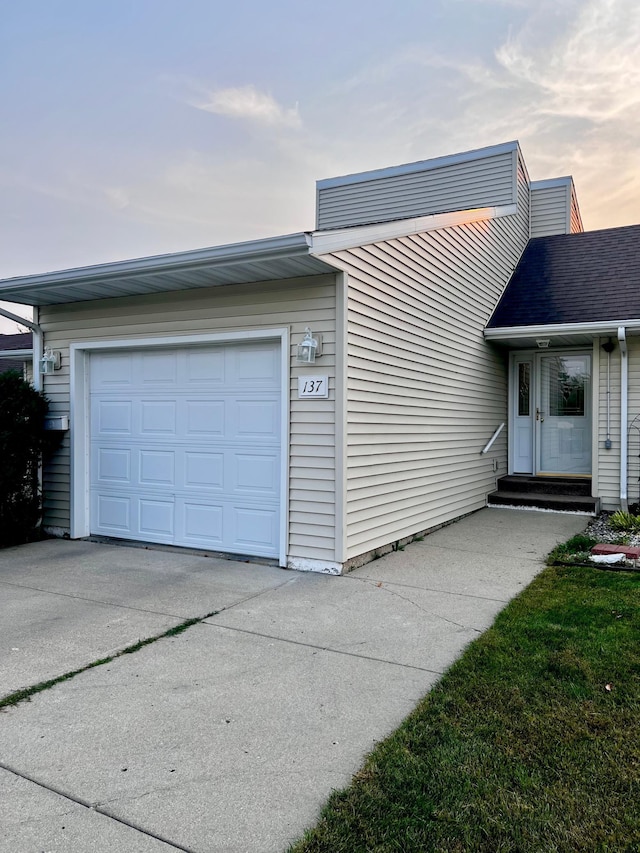 exterior space with a garage