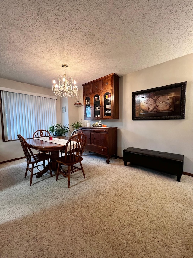 carpeted dining room featuring a textured ceiling and a notable chandelier