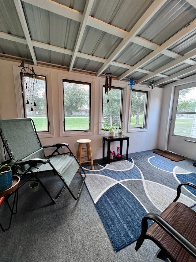 sunroom featuring basketball hoop and plenty of natural light