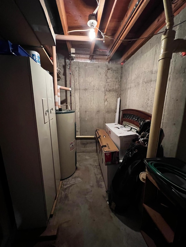 basement featuring electric water heater