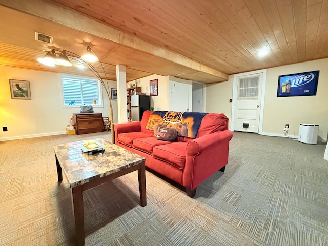 carpeted living room with wooden ceiling