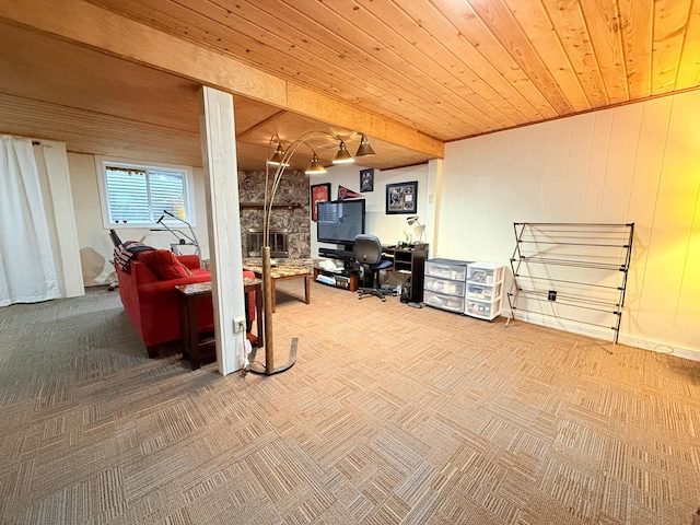 basement featuring wooden ceiling and carpet floors