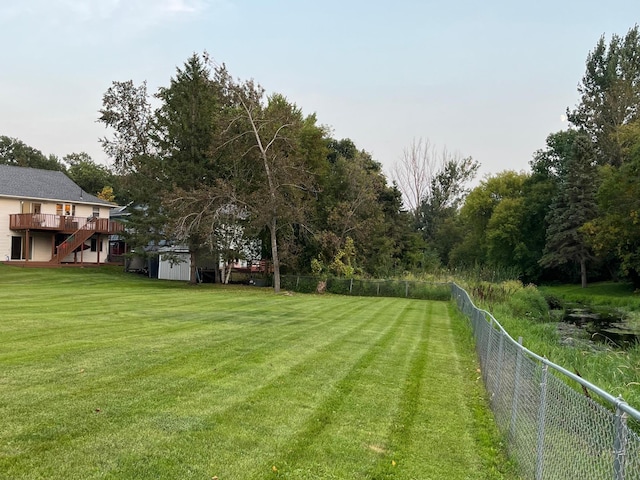 view of yard with a deck