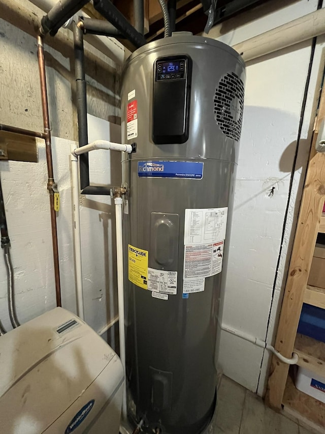 utility room featuring water heater