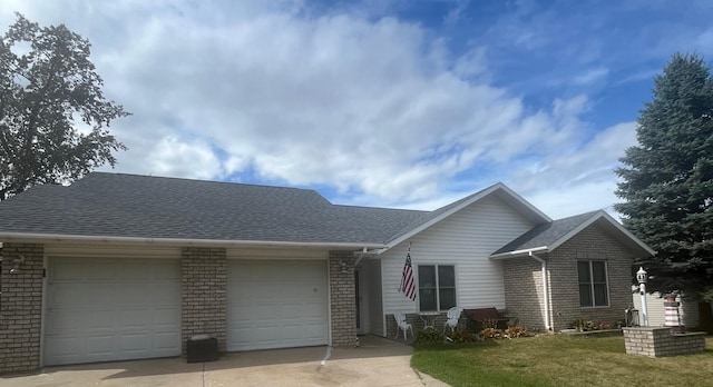 ranch-style home with a garage