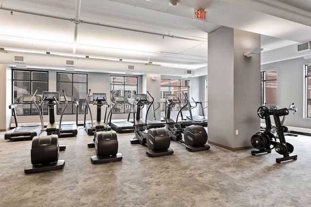 workout area with baseboards and visible vents