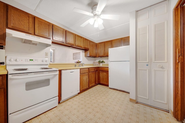 kitchen with ceiling fan and white appliances