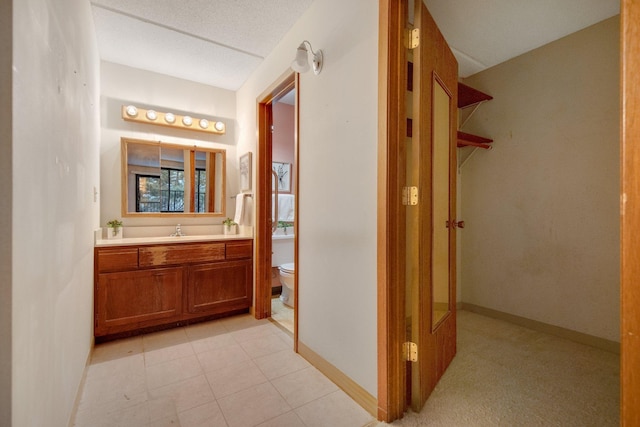 hallway featuring sink