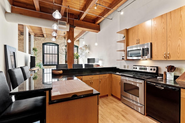 kitchen with wooden ceiling, light wood-type flooring, beamed ceiling, stainless steel appliances, and brick wall