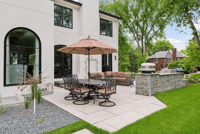 view of patio / terrace with outdoor lounge area and area for grilling