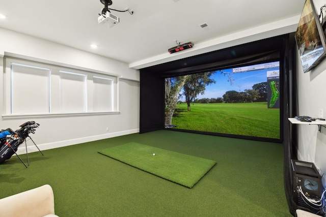 playroom featuring golf simulator and carpet floors